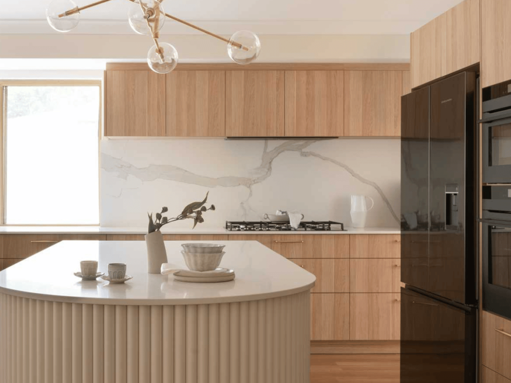 calacatta michaelangelo splashback in coastal kitchen