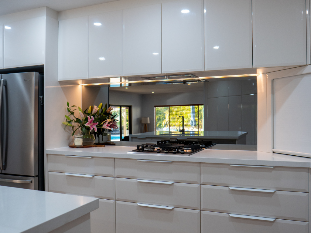 Dark mirror splashback in Perth kitchen bigger