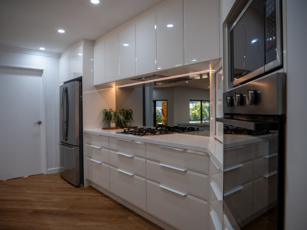 Dark mirror splashback in Perth kitchen