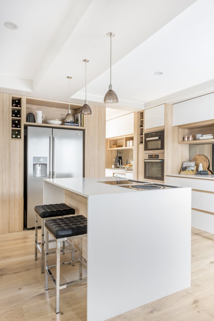 Timber kitchen with mirror splashback